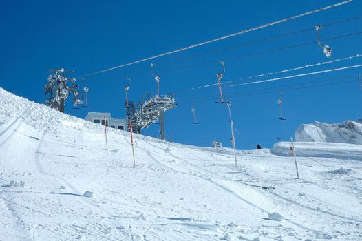 Drag lift on Hintertux glacier nearby Zillertal valley in Austria