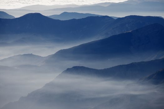 High mountain landscape in hazy weather