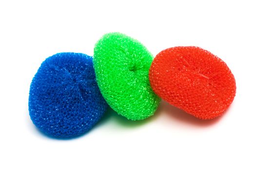 red, green and blue sponge on a white background