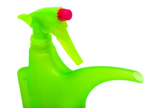 Green watering can on a white background