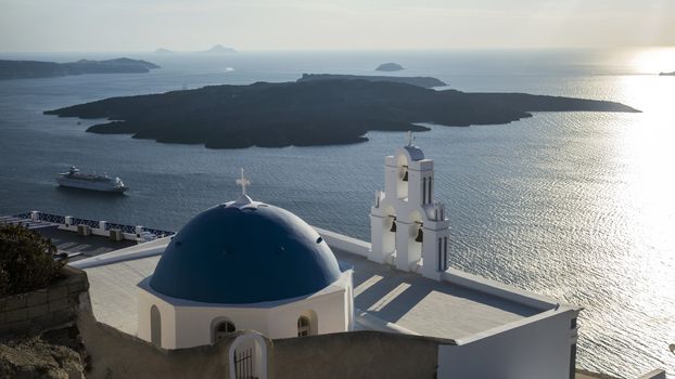 Sunset in Santorini church (Firostefani), Greece