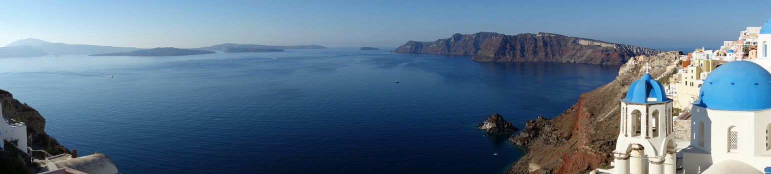 Beautiful blue ocean and white houses in Santorini ,Greece