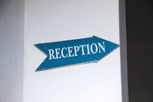 Reception Sign closeup on the wall