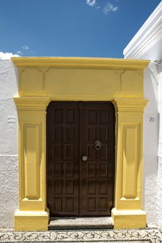 Old pattern door and white house in Rhodes 