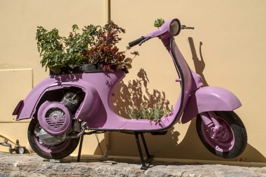 Old purple Vintage scooter in Rhodes Greece 