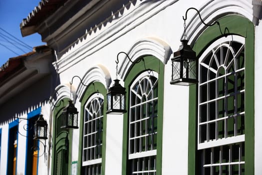 green painted windows of the beautiful portuguese colonial typical town of parati in rio de janeiro state brazil