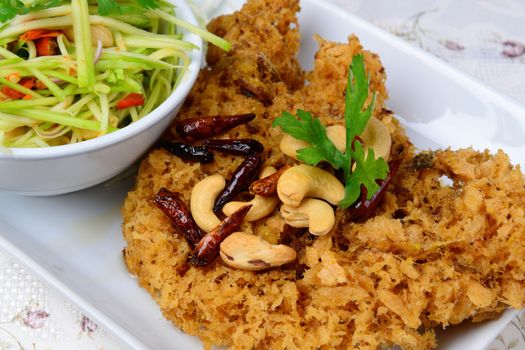 Thai food name crispy catfish salad with green mango