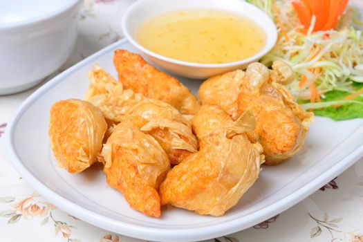 chinese food name Deep fried shrimp rolled on white dish