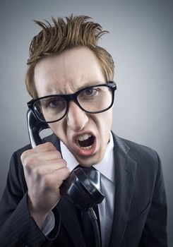 Angry nerd businessman retro telephone call shouting