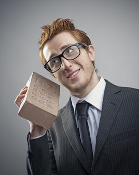 Portrait of mad Nerdy businessman with a unusual cell phone