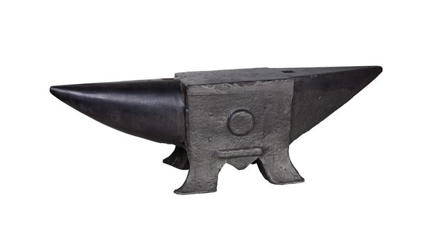 Old anvil on white background, heaviness and strenght concept.