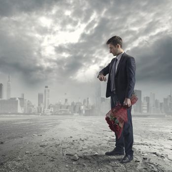 Elegant man waiting for a date with red roses on futuristic metropolitan background.