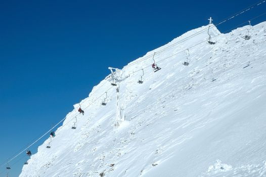 Ski lift on Hintertux glacier nearby Zillertal valley in Austria