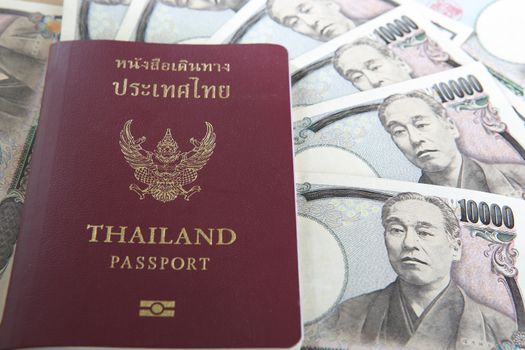 Thailand passport and Japanese Yen money