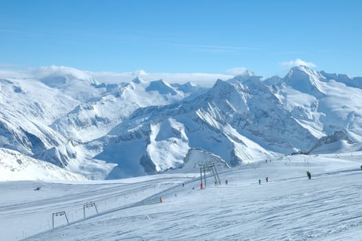 Ski slopes on Hintertux glacier in Alps nearby Zillertal valley in Austria