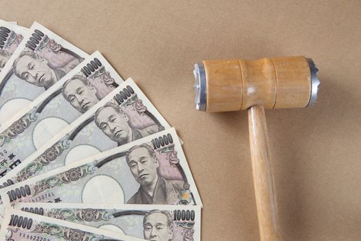 Wooden gavel and money