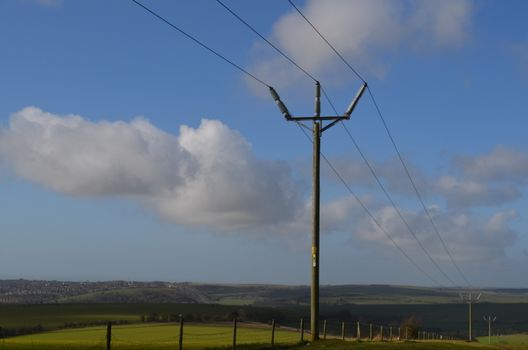 Rural medium sized UK electricity pole on the Sussex South Downs.