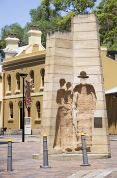 SYDNEY, AUSTRALIA-December 19th 2913: The sculpture "First Impressions" located in Playfair Street, The Rocks. The sculpture was created by Bud Dumas as a memorial to the first settlers in Australia.