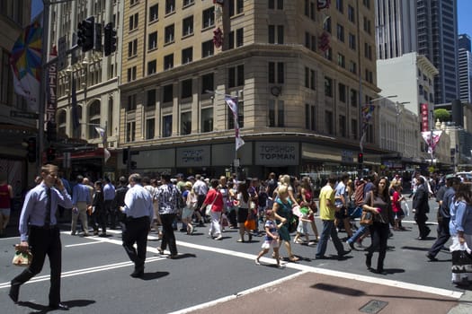 SYDNEY, AUSTRALIA-December 19th 2913: A busy lunctime on George Street. The street was the original high street and is one of the busiest in Sydney.