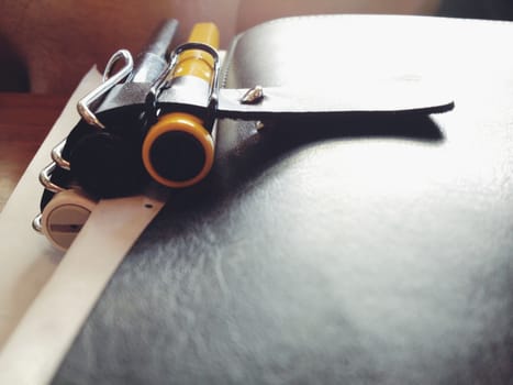 Notebooks and paper on a desk