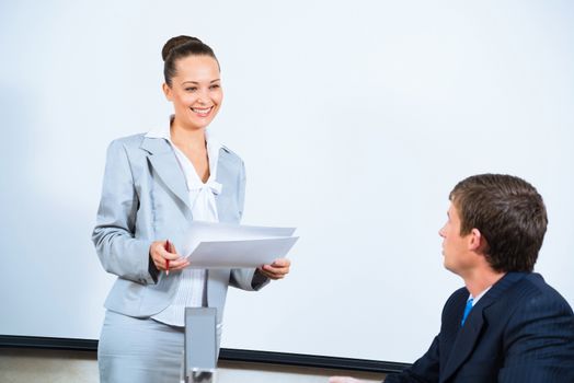 image of a discusses business woman with colleagues