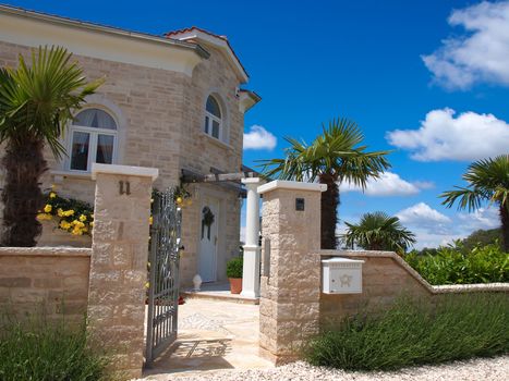 stone house with mail box