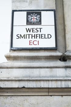 LONDON, UK - FEBRUARY 16: Street signs in the nearly one thousand years old Smithfield market. The current building is over one hundred and forty years old. February 16, 2014 in London.