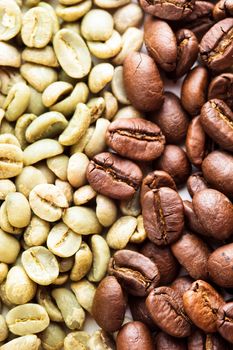 Black and green coffee beans as a background. Various types of coffee