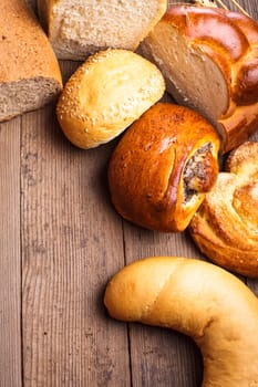 Types of homemade bread on the rustic wooden table