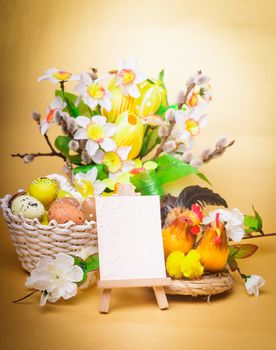 Easter greetings with eggs, flowers and chiken