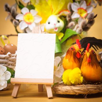 Easter greetings with eggs, flowers and chiken