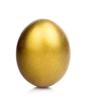 One golden egg isolated on white background