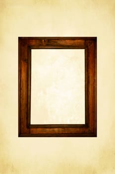 Old rustic wooden frame on bright canvas wall