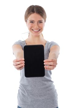 Young woman holding a blank touchpad, communication concept