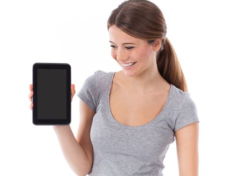 Cheerful woman presenting a touchpad, communication concept