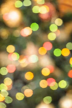 Defocused Christmas tree lights as a holiday background