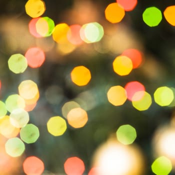 Defocused Christmas tree lights as a holiday background