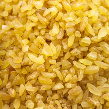 Raw bulgur close up as a background