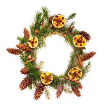 Christmas wreath with dry orange slices and cinnamon sticks