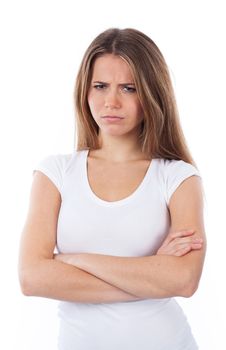 Portrait of an unhappy woman with arms crossed, isolated on white