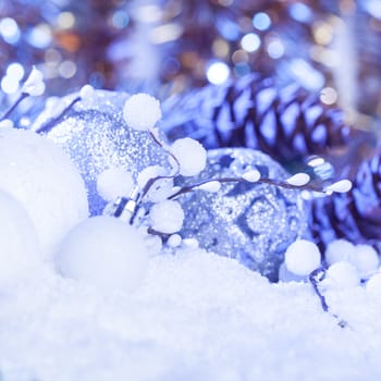 White and silver christmas decor with blue light