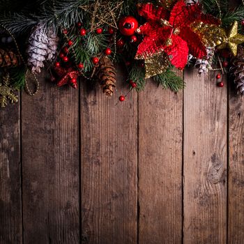 Christmas border design on the wooden background