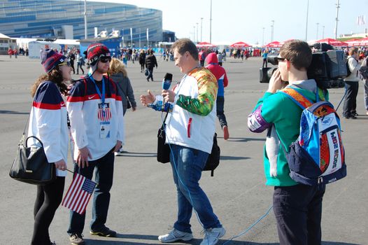 Journalist has interview with american spectators at XXII Winter Olympic Games Sochi 2014, Russia, 15.02.2014