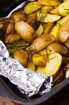 Rusic style potato  with rosemary baked in foil