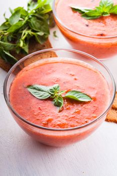 gaspacho - cold tomato soup in glass bowl