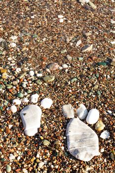 Stone foots on the beach. Spa or vocation concept. Adriatic seashore