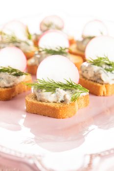 canapes with cream cheese pasta with dill and radish