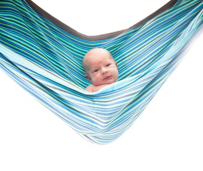 Baby in hammock isolated on white background