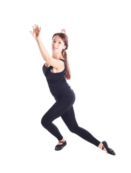 Young girl in black shows dance, fitness, exercise