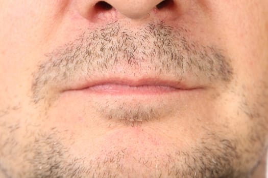 Stubble on face. Close-up as an independent background.